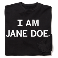 A folded black crewneck sweatshirt with centered white ink text that reads "I Am Jane Doe."