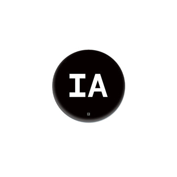 A black circular Iowa button containing the white letters IA with a small registration symbol below them.