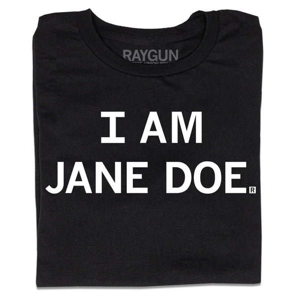 A folded black t-shirt with centered white print text that says, 