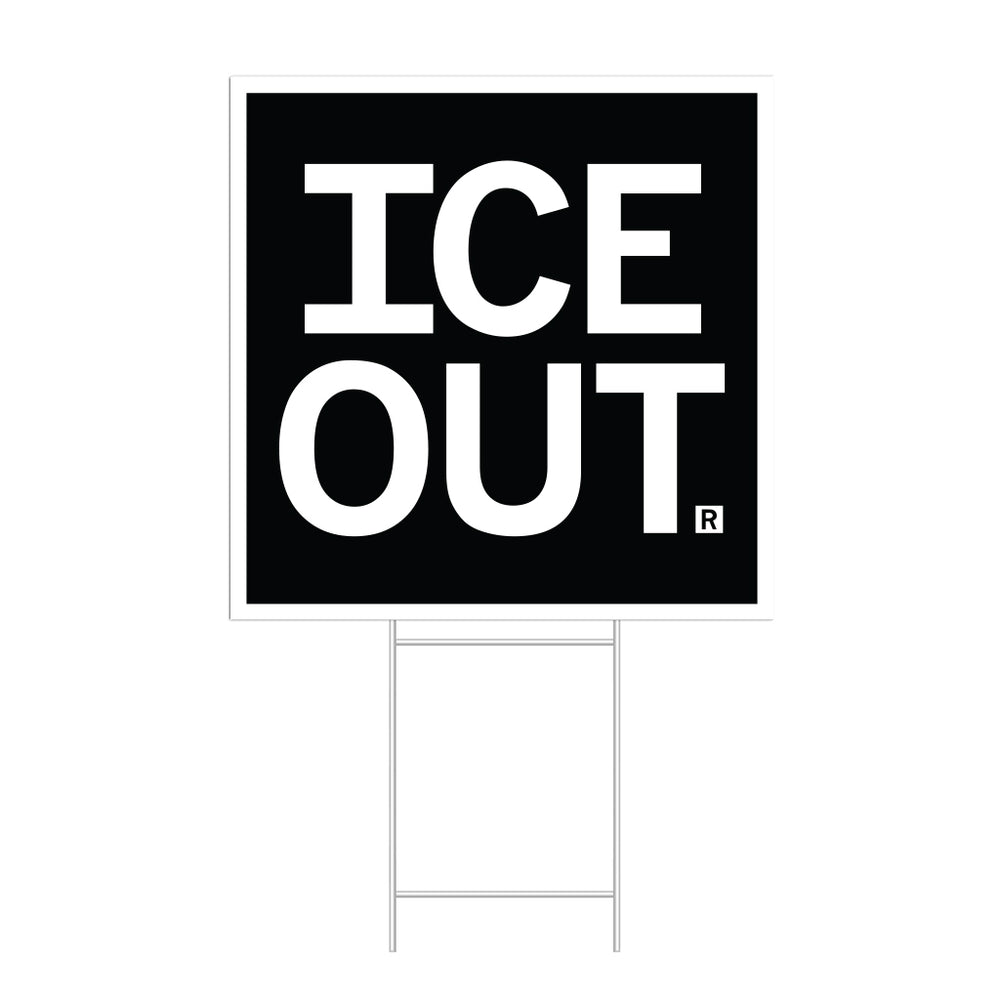 A square black yard sign with a white border and white text that says, "ICE OUT"