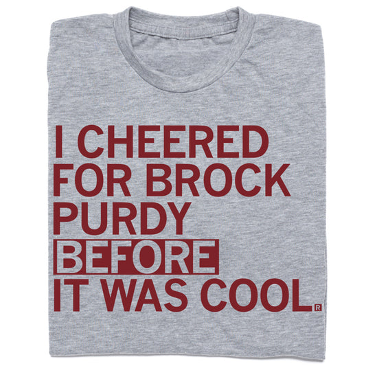 Heather grey t-shirt with the red text I CHEERED FOR BROCK PURDY BEFORE IT WAS COOL.