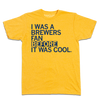 Short-sleeve heather yellow t-shirt with navy print text that says, "I WAS A BREWERS FAN BEFORE IT WAS COOL."