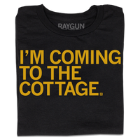 Black t-shirt with left-aligned gold ink text that says, "I'm Coming To The Cottage"