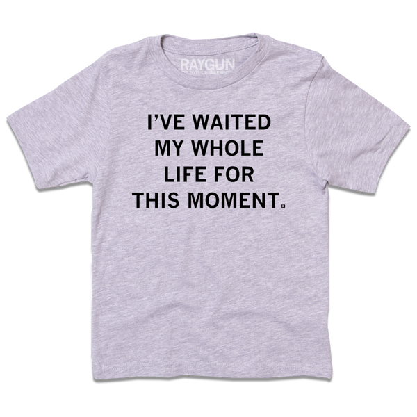 A heather grey youth size t-shirt with centered black ink text that says, 