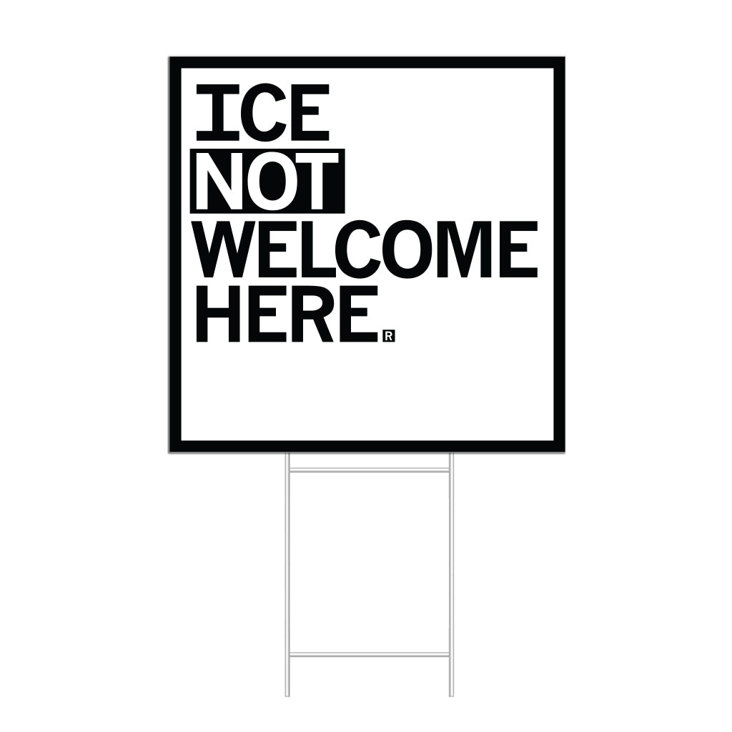 A square white yard sign with a black border and left-aligned black text that reads "ICE NOT WELCOME HERE"
