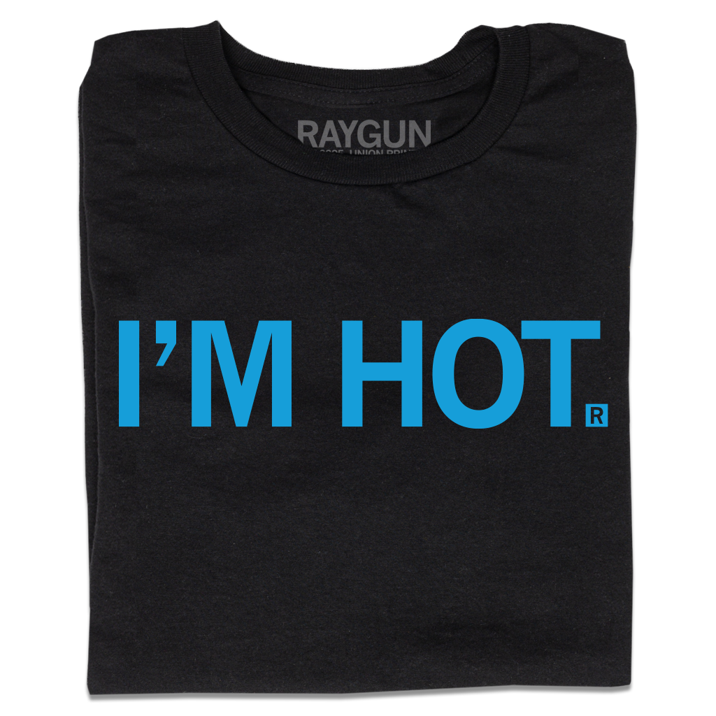 A folded black t-shirt with all caps blue text that says, "I'm Hot."