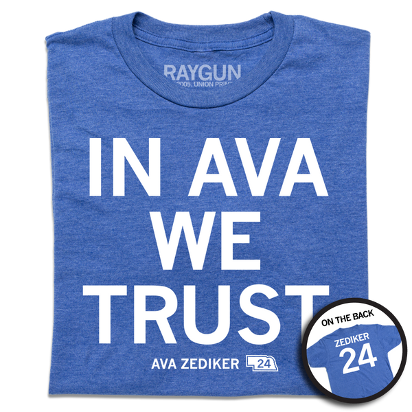 A folded heather royal blue shirt with stacked white ink text that reads 