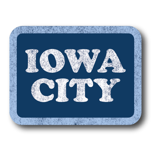 A vintage style, faded rectangle sticker with a blue background, pastel blue border, and white text that say, 