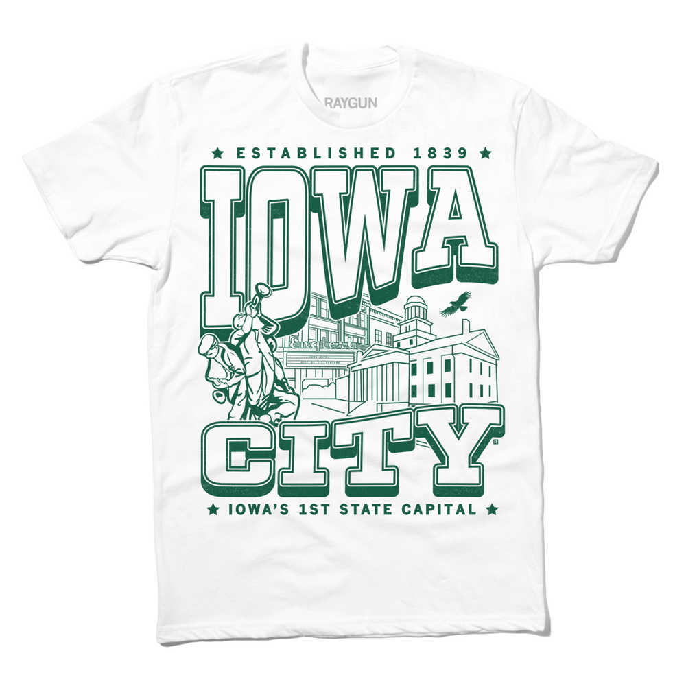 White tee with kelly green ink that says, "Iowa City: Established 1839. Iowa's first state Capital" with and illustrated Iowa City staples in the center, including the Englert Theater and the old Capitol Building.