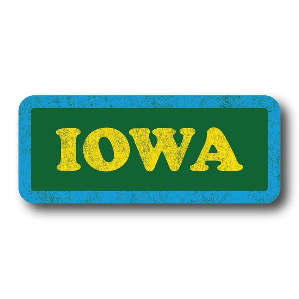 Vintage style sticker with faded print. It's a green rectangular sticker with rounded corners, a blue border and yellow text that says, 