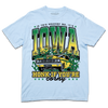 A Comfort Colors hydrangea t-shirt with green & gold ink that says, "Is this heaven? No, It's Iowa. Honk if you're corny" with a graphic of an old muscle car driving out of corn fields with a cat behind the steering wheel.
