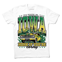 White t-shirt with green & gold ink that says, "Is this heaven? No, It's Iowa. Honk if you're corny" with a graphic of an old muscle car driving out of corn fields with a cat behind the steering wheel.
