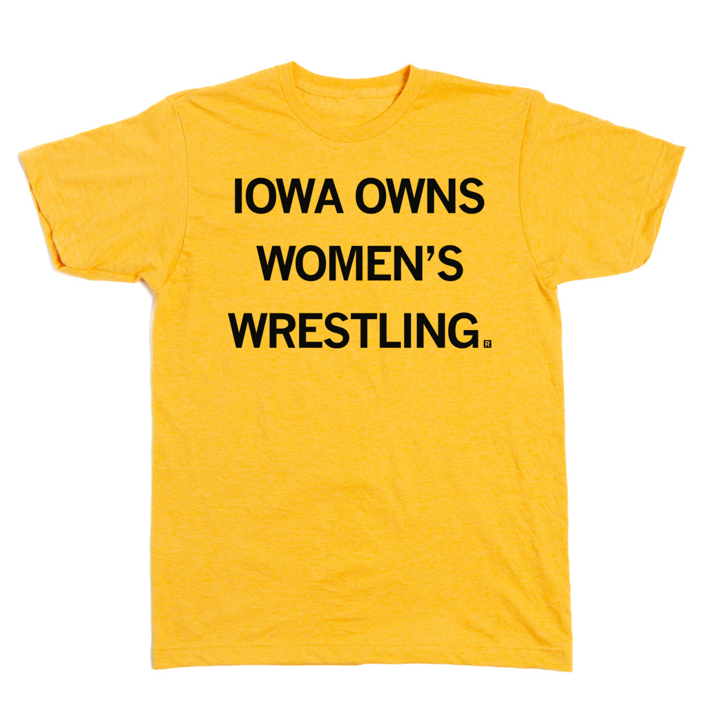 Yellow RAYGUN T-shirt with the text IOWA OWNS WOMENS WRESTLING. printed in black.