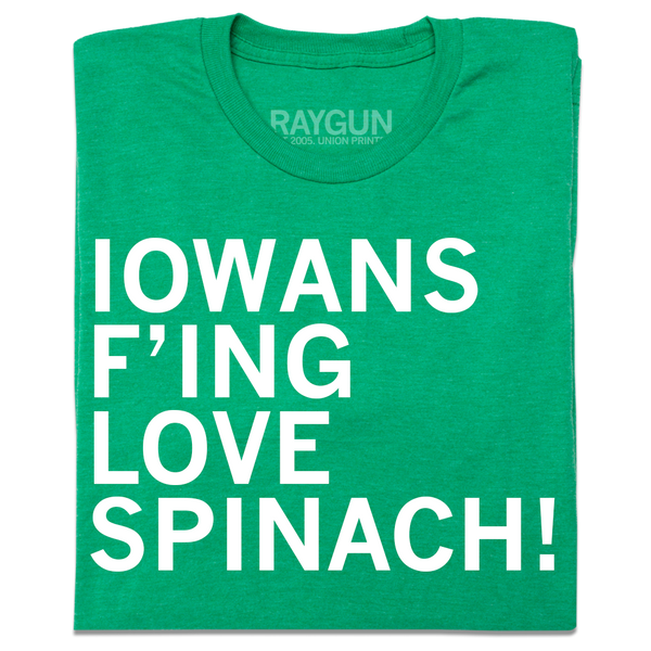 A folded heather kelly green t-shirt with left-aligned white ink text that reads 