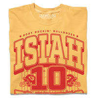 Comfort Colors mustard t-shirt with red ink that reads "The Body Rockin' Bulldozer, Isiah Pachecho #10. The ground hates to see him running" over an illustration of a football field with a football helmet to either side.