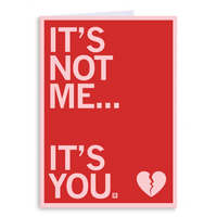 Red greeting card with a pink border and left-aligned pink text that reads "It's not me...it's you" with a broken heart in the bottom right orner