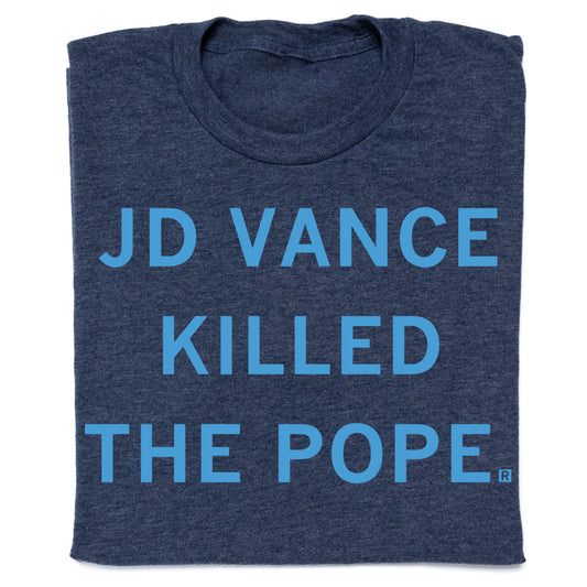 A heather denim t-shirt with the text JD VANCE KILLED THE POPE printed in light blue capital letters.