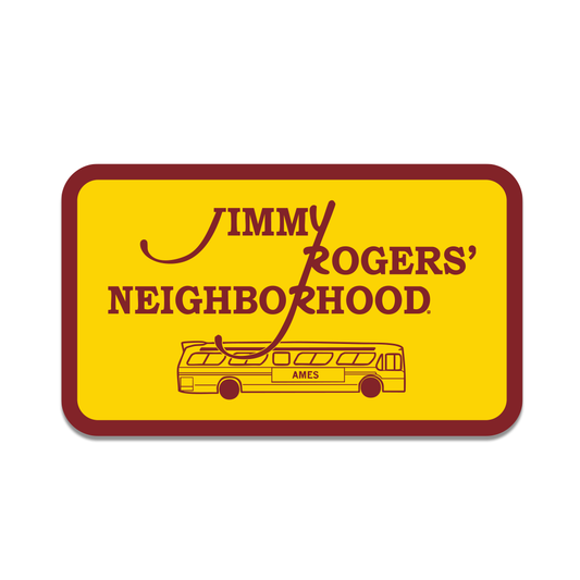 A gold rectangular sticker with curved edges, a cardinal boarder, and cardinal text that reads "Jimmy Rodger's Neighborhood" over an illustration of a bus with "Ames" printed on the side.