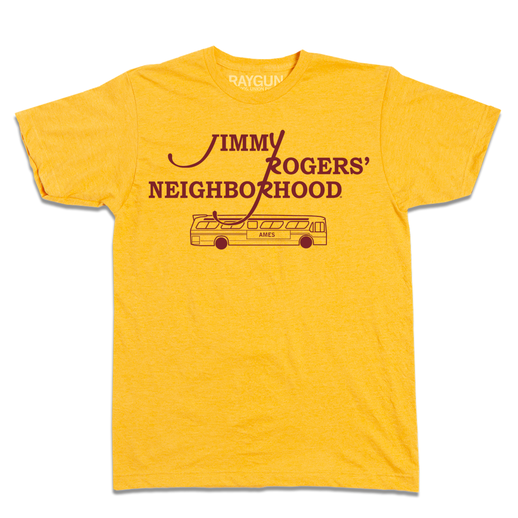 Heather gold t-shirt with cardinal ink that reads "Jimmy Rodger's Neighborhood" over an illustration of a bus with "Ames" printed on the side.