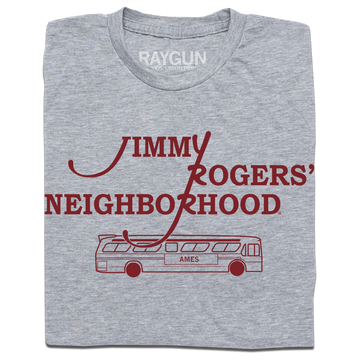 A folded heather grey shirt with cardinal ink that reads "Jimmy Rodger's Neighborhood" over an illustration of a bus with "Ames" printed on the side.
