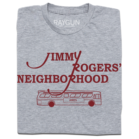 A folded heather grey shirt with cardinal ink that reads "Jimmy Rodger's Neighborhood" over an illustration of a bus with "Ames" printed on the side.