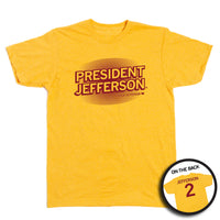 A heather gold shirt with cardinal print that says, "President Jefferson" in large centered font above smaller, right-aligned text that reads "Joshua Jefferson 2." The back of the shirt is styled like a basketball jersey and says, "Jefferson 2."