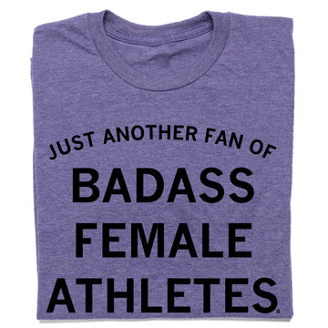 A sweatshop-free purple t-shirt featuring the black text JUST ANOTHER FAN OF BADASS FEMALE ATHLETES.