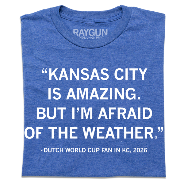 A folded heather blue t-shirt with white ink text that says, 