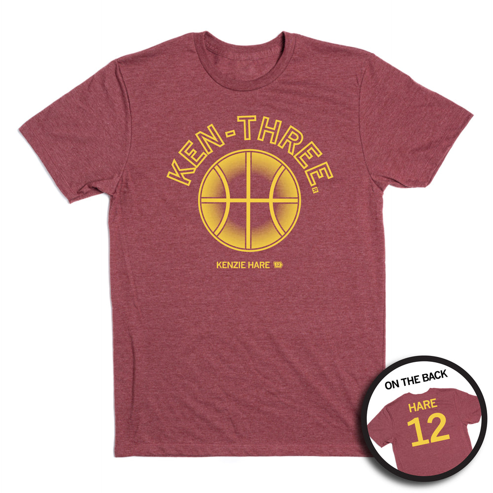 A heather burgundy t-shirt with gold ink that says, "Ken-three" above a basketball on the front and "Hare 12" on the back.
