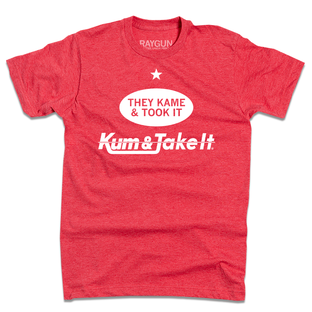 Heather red T-shirt printed in the USA, featuring a white star, an oval graphic that reads THEY KAME & TOOK IT, and the text Kum & Take It below.