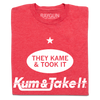 Heather red t-shirt featuring a white star, an oval with the text THEY KAME & TOOK IT, and the text Kum & Take It at the bottom.