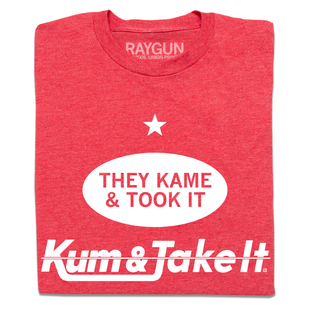 Heather red t-shirt featuring a white star, an oval with the text THEY KAME & TOOK IT, and the text Kum & Take It at the bottom.