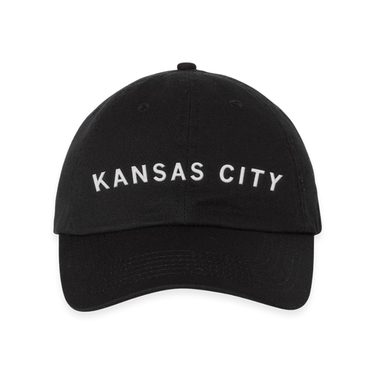Black RAYGUN baseball cap with KANSAS CITY embroidered in white text on the front.