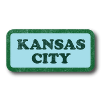 Pastel blue rectangular sticker with green border and dark green text in a vintage, faded style that says, "KANSAS CITY"