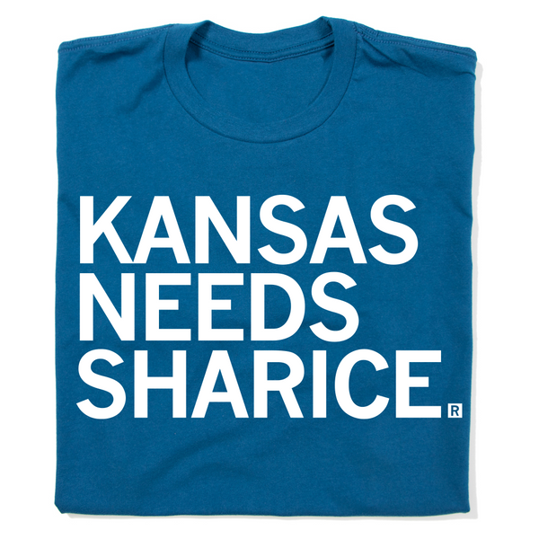 A folded cool blue t-shirt with left-aligned white ink text that reads 