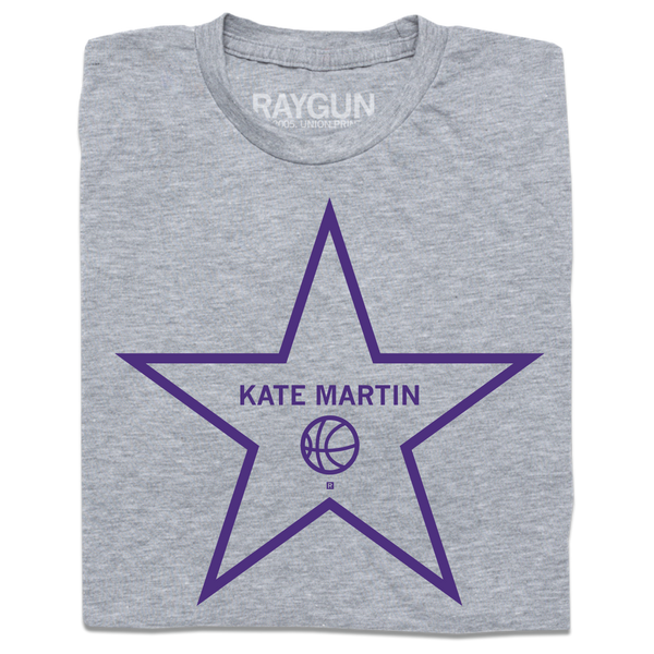 A folded heather grey t-shirt with purple ink depicting a Hollywood start that says, 
