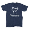 Heather denim blue short-sleeved t-shirt with a white graphic of two martini glasses and the text Ken’s Speakeasy • Des Moines, Iowa.