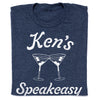 Heather denim t-shirt with white text reading Ken’s Speakeasy above an illustration of two clinking martini glasses.