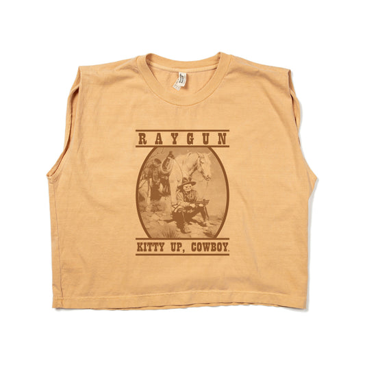 Tan cropped heavyweight muscle tank top featuring a brown graphic of a cat dressed as a cowboy next to a horse, with the text RAYGUN and KITTY UP, COWBOY.
