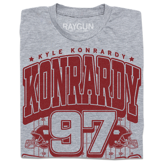 Heather grey T-shirt featuring a maroon Kyle Konrardy 97 graphic with football helmets and yard lines.