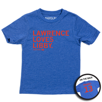 Heather royal youth shirt with red ink in left aligned font that reads "Lawence Loves Libby. Libby Fandel 13" on the front and "Fandel 13" on the back like a jersey.