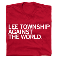 Folded red t-shirt with all caps white text that says, "Lee Township against the world."