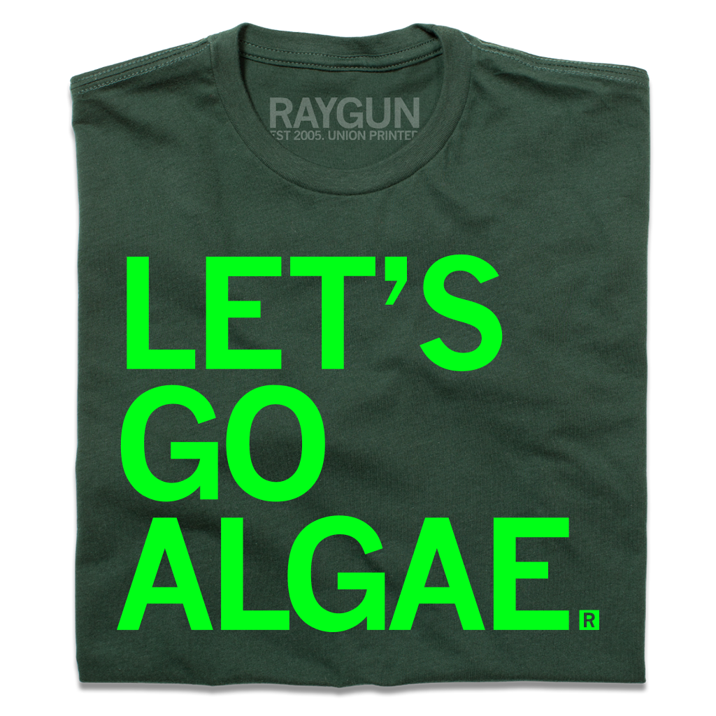 A folded forest green shirt with bright green text that says, "Let's Go Algae"