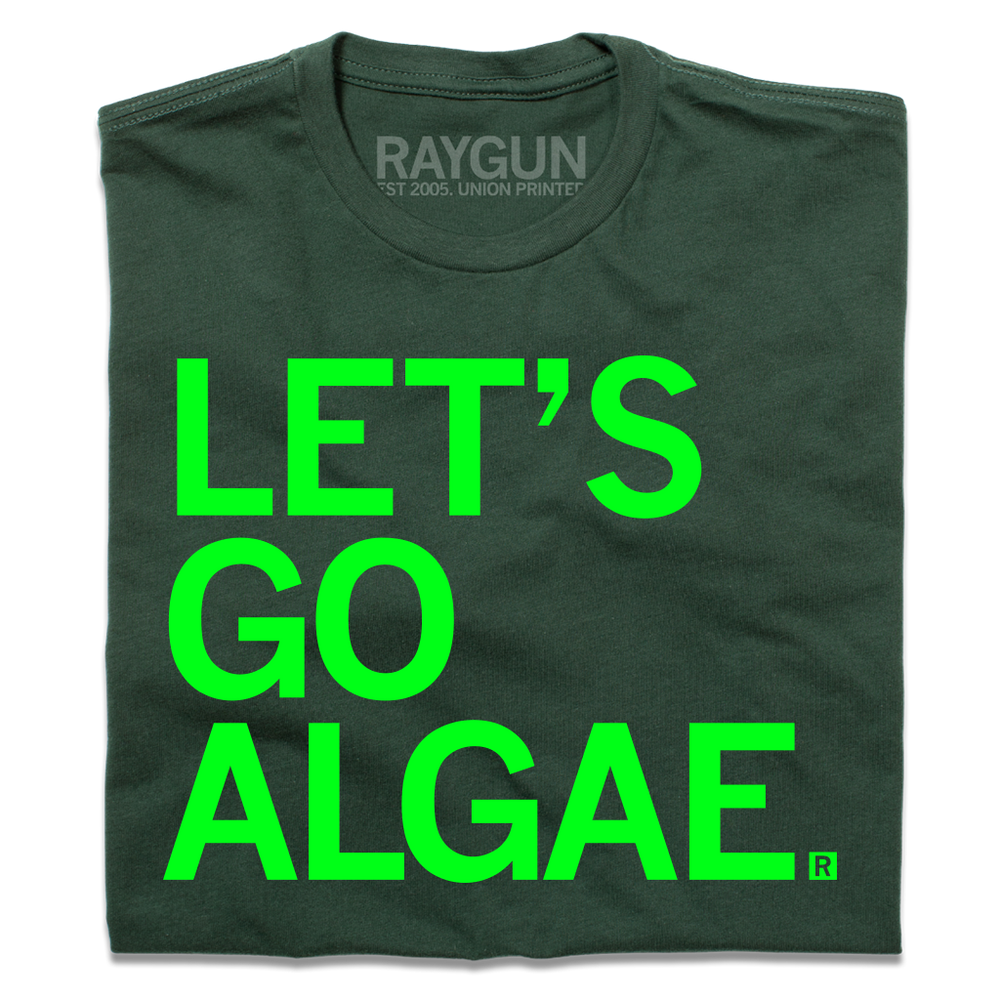 A folded forest green shirt with bright green text that says, "Let's Go Algae"