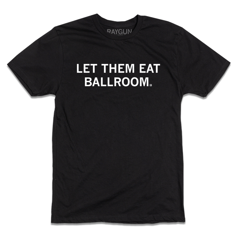 A short-sleeve black t-shirt with centered white in text that reads "Let Them Eat Ballroom"
