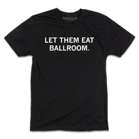 A short-sleeve black t-shirt with centered white in text that reads "Let Them Eat Ballroom"