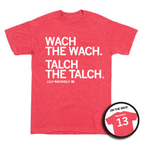 Short sleeve heather red t-shirt with left-aligned white ink that reads "Wach the Wach. Talch the Talch" in all caps with "Lilly Wachholtz" printed in smaller text below. To the right of her name is a small outline of Iowa with "13" in it. A circular image in the bottom right corner shows the back of the shirt. The back is printed like a jersey with "Wachholz" at the top above "13."