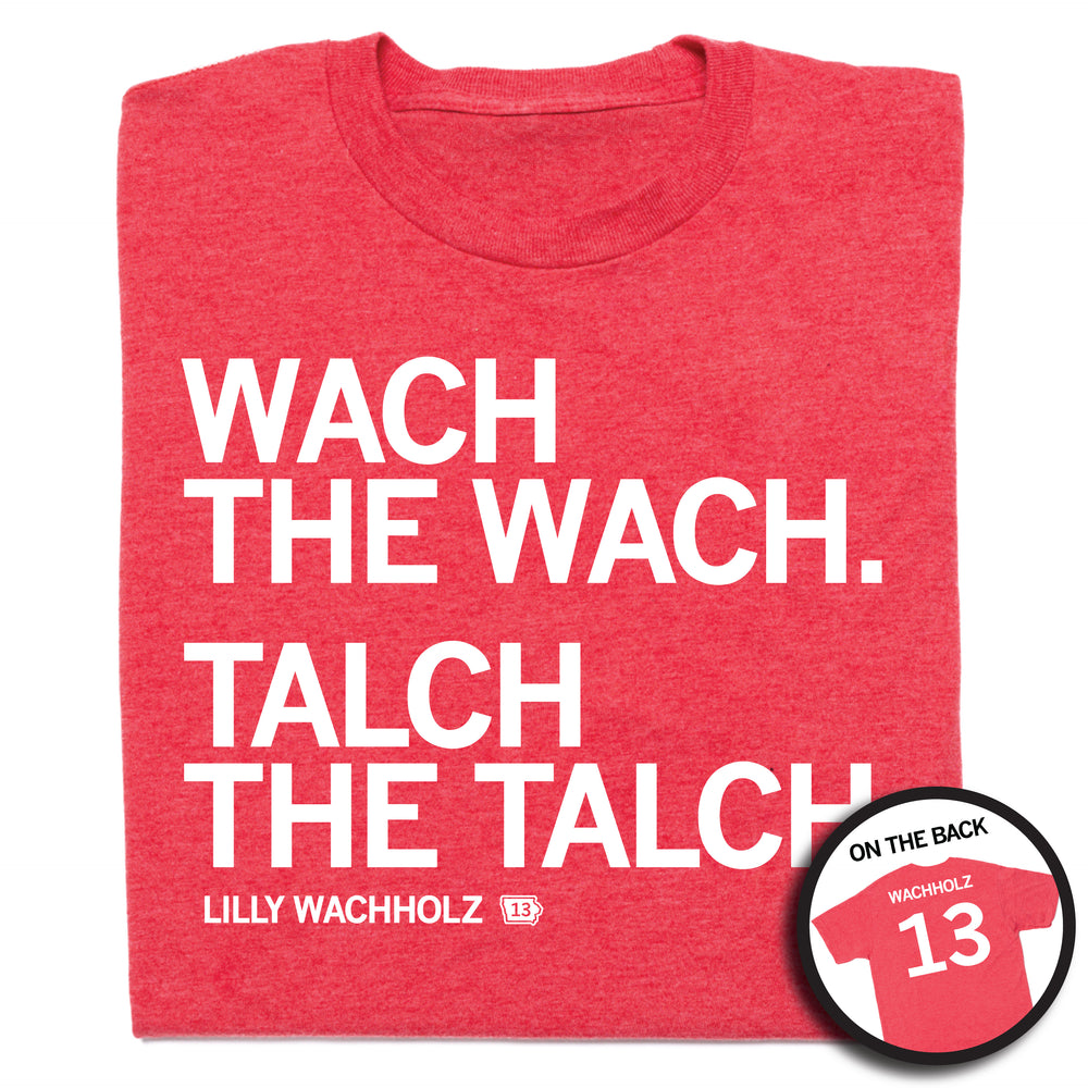Folded heather red t-shirt with left-aligned white ink that reads "Wach the Wach. Talch the Talch" in all caps with "Lilly Wachholtz" printed in smaller text below. A circular image in the bottom right corner shows the back of the shirt. The back is printed like a jersey with "Wachholz" at the top above "13."