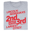 Heather grey t-shirt with red text that reads, Lincoln: Nebraska’s 2nd and 3rd (sometimes) largest cities!.