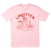 A pink tee with red ink that says "Linkitten" in curved font above RAYGUN's cat mascot wearing a corn cobb hat and holding a football. Behind him are Lincoln landmarks, like the NE state Capitol.